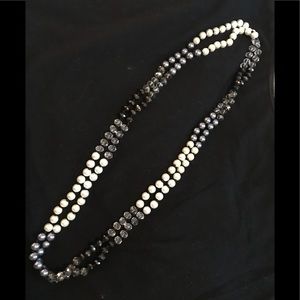Versatile faux pearl and glass bead necklace.